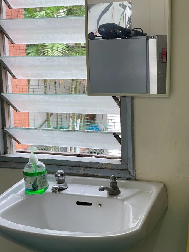 Washing and sink area at Pelangi Capsule Hostel